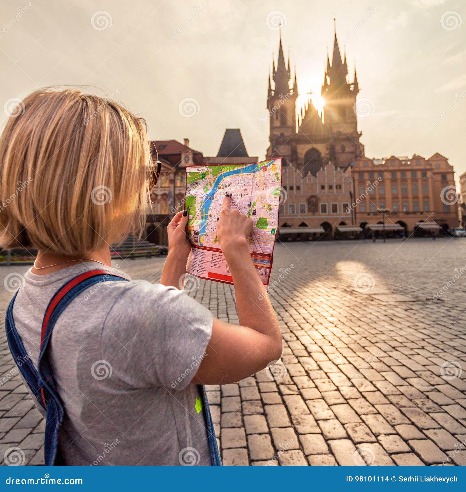 Beautiful Young Girl in Prague Looks at the City Map. Editorial ...